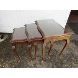 Mahogany nest of tables with glass tops