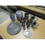 Collection of mostly Pewter items including plates and jugs