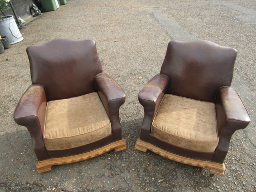 Pair of 1940's club chairs. One has woodworm but has been treated