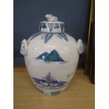 A Chinese lidded jar with frog lid and handles