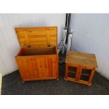 Pine storage chest on wheels and glazed cupboard