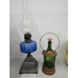 Metal based oil lamp and green glass lamp