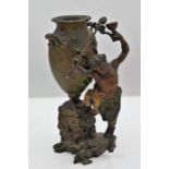 Small cold painted bronze sculpture of a mythical satyr/faun dancing round an urn, stamped "B"