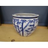 A Chinese jardinniere with blue bamboo detail 24cm tall and 32 cm dia