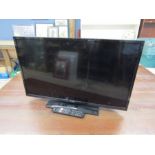 32" Linsar LCD TV with remote from a house clearance