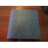 Blue postcard album with colour postcards. not every page photographed
