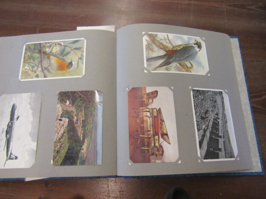 Blue postcard album with colour postcards. not every page photographed - Image 18 of 20