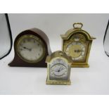 2 x Swiza carriage clocks and a wooden cased small mantel clock