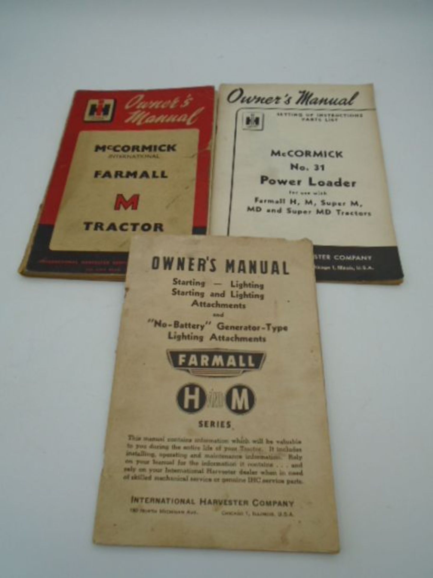 3 owners manuals - 'M' tractor plus 2 others