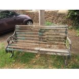 Vintage garden bench with cast iron ends and central support (in need of repair)