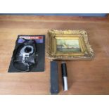 Ornate framed picture of ship, Pentax camera and vintage Otis King calculator in box