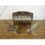 Pair of metal fighting cocks and vintage wooden spice rack with cockerel detail and glass spice