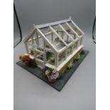 A scratch built greenhouse made for BBC Gardeners world 1996 29cm long and 17cm high This is made by