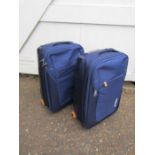 2 American Tourister suitcases