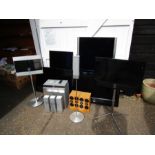 Loewe audio and visual home entertainment setup including 5 TV screens, Blu-ray player, subwoofer