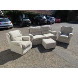 2 Seater sofa, 2 arm chairs and matching foot stool