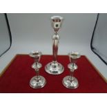 A pair of silver hallmarked candlesticks 1945-55 Birmingham by AL Davenport ltd. 11.5 cm high