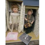 The Ashton-Drake galleries porcelain dolls- 'The little drummer boy' and 'My little ballerina' in
