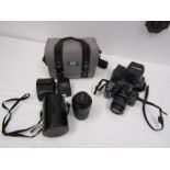 Minolta 7000i camera in bag with Minolta AF 100-300 lens and flash