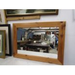 A pine framed mirror 93x68cm