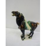 A ceramic Tang horse 18cm tall