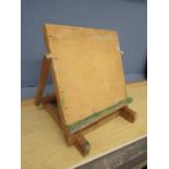 A table top folding easel and a brush/manicure set