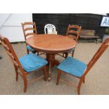 Oak pedestal extending table and 4 chairs