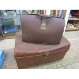 A vintage trunk and leather bag