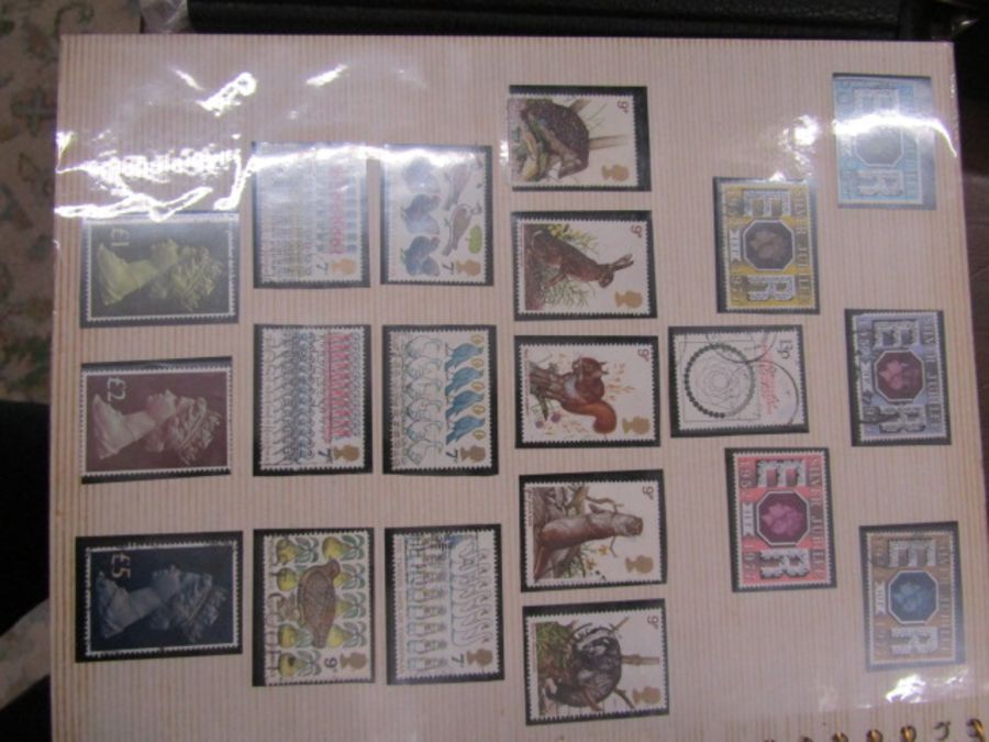 A stamp album containing G.B 1929,1924, 1926, 1/2d-1-1980 mint used. Many gaps - Image 27 of 36