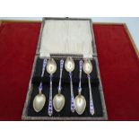 6 Boxed continental silver (950) and enamel spoons