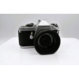 Pentax ME F 35mm SLR Camera, chrome body, shutter working in manual, together with an SMC Pentax-M