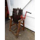 A vintage butter churn by Waide & sons 113cm high