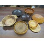 6 hardwood bowls with one having inset Yorkshire rose carved in center and 2 hardwood plates
