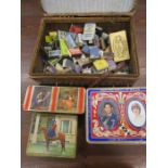 vintage tins and a collection of matches in a picnic basket