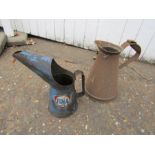 2 Vintage oil jugs including Fina