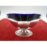 A Silver and blue glass lined sugar bowl hallmarked Sheffield 1962 by Ewart, Perkin and Co ltd.
