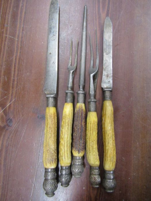Mappin & Webb Antler handled carving sets with silver collars and handle ends