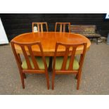 Nathan mid century extending table with 4 chairs leaf concealed underneath and present