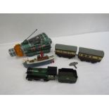 A vintage tin Nasa space capsule, Triang boat, Hornby- type 3- train and carriage and 2 Hornby