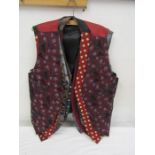8 waistcoats in a variety of patterns and sizes