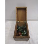 A vintage box of marbles