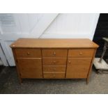 Oak sideboard with 6 drawers and 2 cupboard doors (missing handle in drawer)