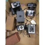 Vintage cameras including Kodak Brownie, Polaroid super colour swinger