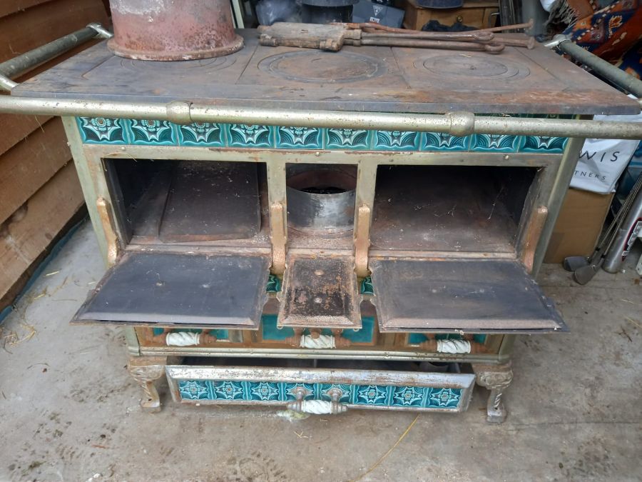 Vintage European cast iron tiled kitchen wood/coal burning stove. Buyer needs to collect from PE38 - Image 2 of 5