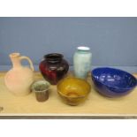 A collection of bowls and vases