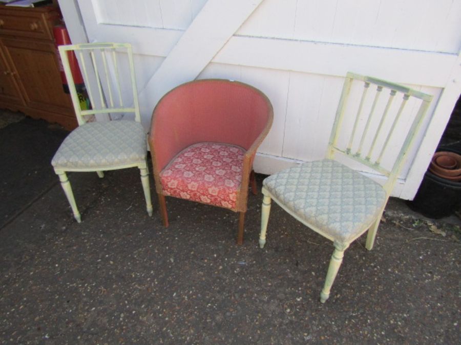 Pair of painted dining chairs and Lloyd Loom style chair