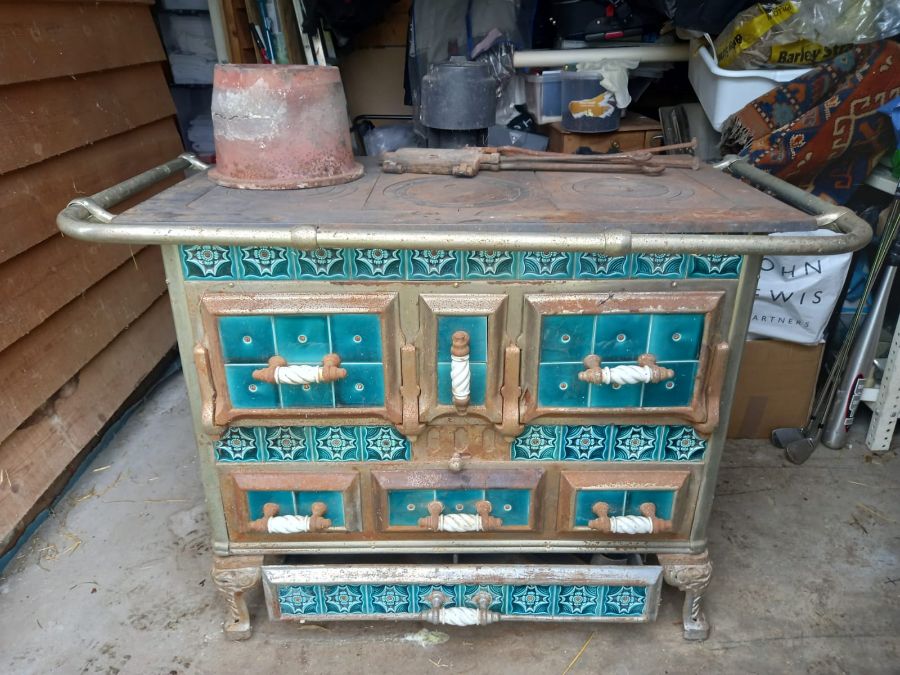 Vintage European cast iron tiled kitchen wood/coal burning stove. Buyer needs to collect from PE38