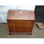 Oak 4 drawer writing bureau with brass handles and eschutcheon's H108cm W107cm D53cm approx