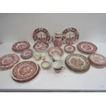 A collection of pink willow china