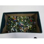 A shoebox of marbles